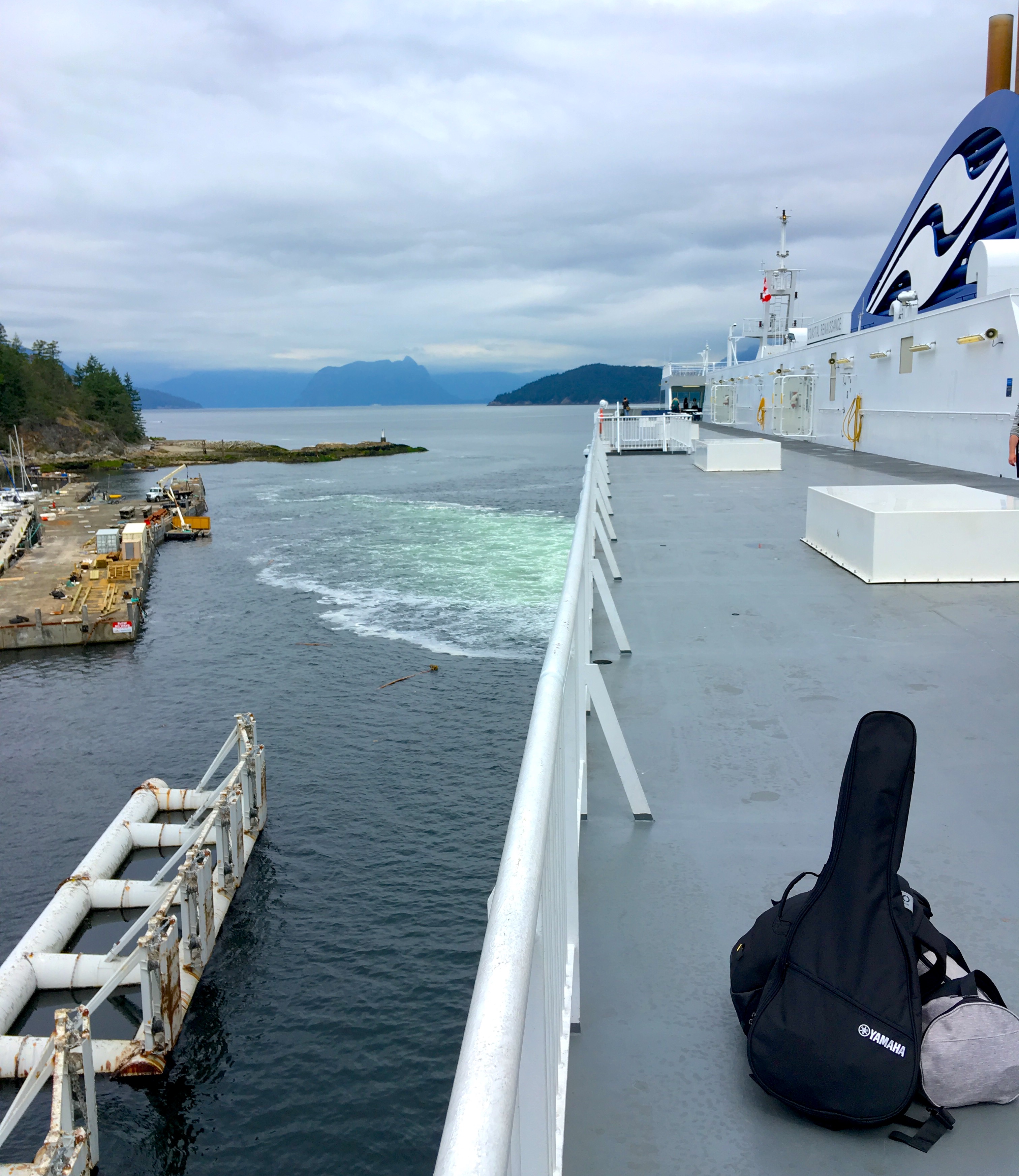 My gear on the ferry to Vancouver Island: one 15L backpack (riutbag), one 20L Decathlon Duffel bag, one Yamaha APXT2. Total weight when packed is 12.7kg, with half of that weight on my back.