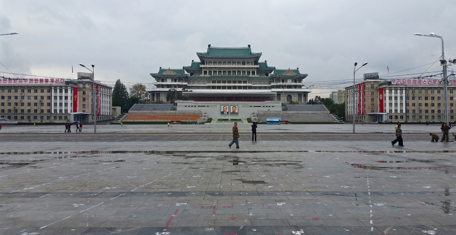 Kim Il-sung Square, the day after the enormous parades. You can see the lines and marks on the ground which had been used to coordinate different groups in their movements. Oh, and that's our camera team on the right.