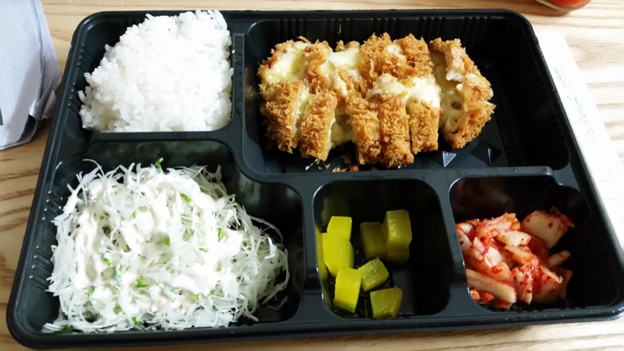 Donkatsu is a popular choice for takeout, and this one has cheese in it, too. Amazing.